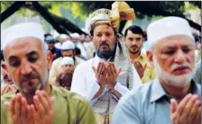  ?? (AP/Muhammad Sajjad) ?? Muslims pray the Eid al-Fitr prayer, marking the end of Ramadan, Islam’s holy month of fasting, Monday in Peshawar, Pakistan.