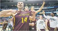  ?? ASHLEY LANDIS/TNS ?? The Loyola Ramblers celebrate a 63-62 win against Tennessee in the second round of the NCAA Tournament on Saturday.