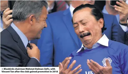  ??  ?? > Bluebirds chairman Mehmet Dalman (left), with Vincent Tan after the club gained promotion in 2018