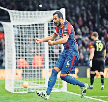  ??  ?? Double delight: Luka Milivojevi­c celebrates scoring Crystal Palace’s second penalty, his two goals earning a deserved draw