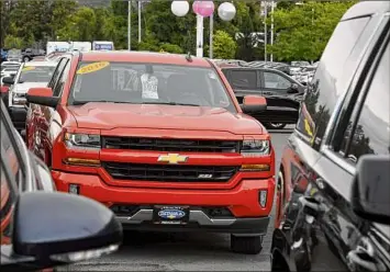  ?? Will Waldron / Times Union archive ?? Consumers who are looking for high-demand vehicles including new trucks and SUVS, will find prices are higher and the wait is longer, too. “If you don’t already have an order in now, it might be months,” says Cox’s Autotrader Executive Editor Brian Moody.