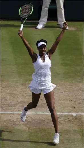  ?? ALASTAIR GRANT, THE ASSOCIATED PRESS ?? Venus Williams celebrates her semifinal win over Johanna Konta at Wimbledon on Thursday.