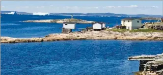  ??  ?? ROB MUNRO/Special to The Daily Courier Above: The view from Battle Harbour, a restored fishing village off the coast of Labrador, includes a clear view of Iceberg Alley in early July. Below left: The MV Apollo ferry from Newfoundla­nd to Labrador...