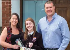  ??  ?? Amy Howick with her parents.