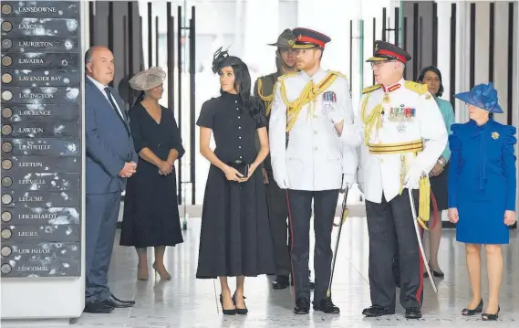  ?? Photo / AP ?? Meghan wore Emilia Wickstead when she attended the opening of Anzac Memorial in Sydney with Prince Harry yesterday.