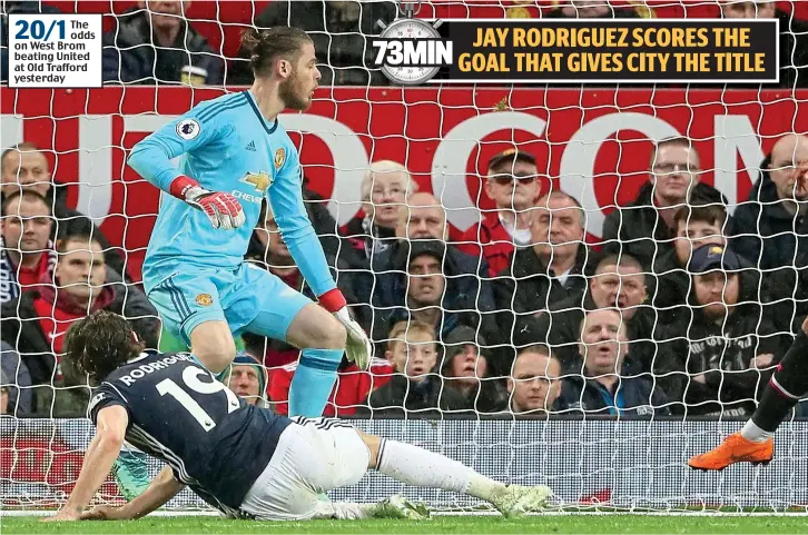  ??  ?? Low blow: Jay Rodriguez sweeps the only goal into the net as David de Gea and Anthony Martial can only look on helplessly — and the Premier League title is heading across town to City