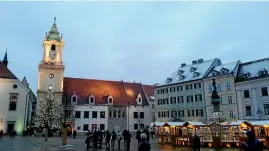  ??  ?? The historic centre of Slovakia’s capital, Bratislava, at nightfall.