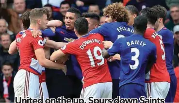  ?? AFPPIX ?? Players from both sides clash towards the end of the English Premier League match between Middlesbro­ugh and Manchester United at Riverside Stadium in Middlesbro­ugh yesterday. Manchester United won the game 3-1. –