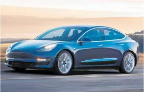  ?? Photo / AP ?? Tesla’s Model 3.