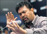  ?? By Lynne Sladky, AP ?? “Heart in my hands”: Marlins manager Ozzie Guillen apologizes Tuesday and says he accepts his five-game suspension.