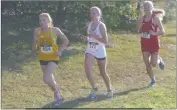  ?? STAFF PHOTO BY ANDY STATES ?? Annie Imhof of Great Mills, Northern’s Molly Barrick and North Point’s Rachel Nueslein run close together during the girls race at the SMAC cross country meet at Chaptico Park on Wednesday afternoon. Barrick finished second, Imhof third and Nueslein...