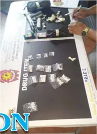  ?? ?? A couple yields P350,000 worth of suspected shabu in Silay City. The police confirmed one of them was in the “severed hands” list found last month.