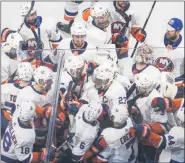  ?? JASON FRANSON — CANADIAN PRESS ?? The New York Islanders celebrate their double-overtime win in Game 5 of the NHL Eastern Conference finals Tuesday night in Edmonton, Alberta.