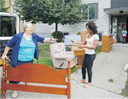  ?? GRAHAM HUGHES ?? Wendy, left, is one of the many people who responded to a story in the Montreal Gazette about Joanne Clotaire. Two weeks ago, Clotaire moved with her two sons into an empty apartment. Then help came pouring in from across Montreal. “To say thank you is...