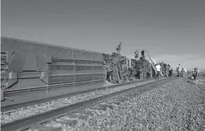  ?? KIMBERLY FOSSEN VIA AP ?? The westbound Empire Builder train derailed about 4 p.m. Saturday near Joplin, a town of about 200, Amtrak spokesman Jason Abrams said in a statement. Amtrak confirmed three deaths and said there were multiple injuries.