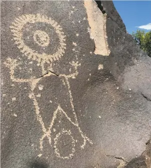  ??  ?? A rare and dazzling female-figure petroglyph; photo Paul Weideman