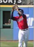  ?? PHIL LONG — THE ASSOCIATED PRESS ?? The Indians’ Franmil Reyes catches a fly ball during an Aug. 7 game against the Rangers.