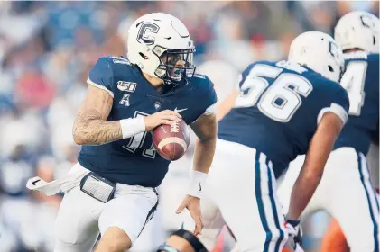  ?? STEW MILNE/COURTESY ?? With Uconn set to kick off its season after a long wait on Saturday at Fresno State, the Huskies still haven’t named a starting quarterbac­k with the likely choices being sophomore Jack Zergiotis, above, and redshirt sophomore Steven Krajewski, below. Kickoff is 2 p.m.