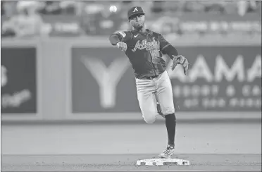  ?? Gary A. Vasquez/USA TODAY Sports ?? Atlanta Braves second baseman Ozzie Albies (1) throws to first for the out against Los Angeles Dodgers right fielder Andy Pages (84) during the eighth inning at Dodger Stadium on May 4.