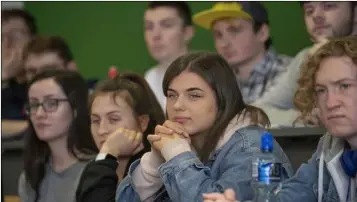  ??  ?? Above, BA (Hons) Film and TV Production students listening to John Moore during his filmmaking masterclas­s and below, Hollywood Filmmaker, John Moore pictured with DkIT President, Michael Mulvey, PhD