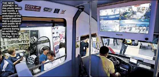  ?? AP ?? THE NEW JEEPNEY: In this photo taken last month, a man checks a prototype of the modern jeepney that is equipped with public wi-fi and on-board camera during an exhibit in Manila. Story on Page 12.