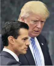  ?? YURI CORTEZ / AFP / GETTY IMAGES FILES ?? The White House aims to have the new trade deal signed by Mexican President Enrique Pena Nieto, left, before his recently elected successor takes office on Dec. 1.