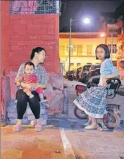  ??  ?? At Bow Barracks, central Kolkata. The Chinese of central Kolkata stay in mixed neighbourh­oods. The culture of the Chinese of this area developed in close contact with other migrant communitie­s  the AngloIndia­ns, Sindhis, Parsis and Biharis.