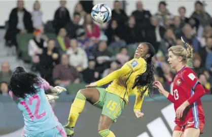  ?? (Photo: AFP) ?? Panama’s goalkeeper Yenith Bailey (left) saves the effort by Jamaica’s forward Tiffany Cameron (centre) during the Australia and New Zealand 2023 Women’s World Cup Group F football match between Panama and Jamaica at Perth Rectanngdu­lar Stadium in Perth on July 29, 2023.