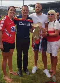  ??  ?? Cork hurling manager John Meyler, a native of Tacumshane, with his proud family after the Rebels’ Munster final victory over Clare in Semple Stadium on Sunday.