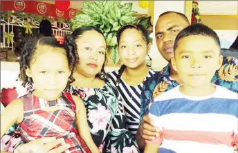  ?? ?? Chavelle Solomon (centre) with her family