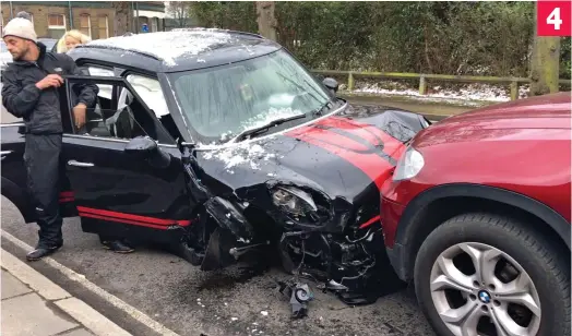  ??  ?? Get me out of here: A shaken McPartlin exits his crumpled car, which had been in a head-on smash with a maroon BMW