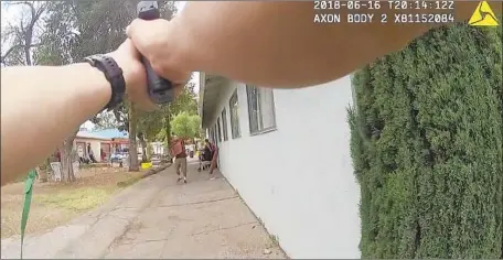  ?? Los Angeles Police Department ?? AN IMAGE from a video shows police confrontin­g Guillermo Perez in Van Nuys. Police fatally shot Perez and bystander Elizabeth Tollison.