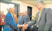  ?? AFP ?? IMF managing director Christine Lagarde (left) greets Pakistan finance minister Asad Umar in Bali.