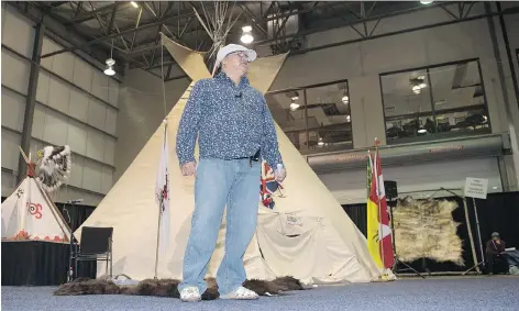  ?? TROY FLEECE ?? Elder Dennis Omeasoo shares traditiona­l knowledge with visitors — especially children — at the Indigenous Pavilion.