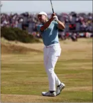  ?? PETER MORRISON — THE ASSOCIATED PRESS ?? Jordan Spieth plays a shot on the 4th hole during the first round of the British Open in Carnoustie, Scotland, Thursday.