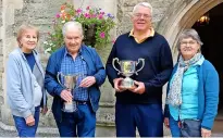  ?? ?? From left, Bath in Bloom volunteer Carol Cruse, honorary president Barry Cruse, chairman Stephen Brook, and committee member Christine Brook