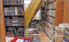  ?? LAWRENCE POWELL ?? Lifting up these shelves and re-alphabetiz­ing numerous book shelves at Endless Shores Books in Bridgetown will take a while. Owner Jennifer Crouse was hoping to re-open Oct. 2 after a weekend cleaning up vandalism.