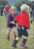  ?? 08_a33MAShow1­4 06_a33MAShow4­2 ?? Maisie and Harry Donaldson from Aberuthven having a dance to the Loch Fyne Pipe Band. Tarbert lad Ryan Taylor has fun bodyzorbin­g.