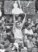  ?? POSTMEDIA ?? Fans make their point during the last home game ever of the Montreal Expos at the Olympic Stadium in 2004.