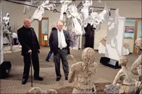  ?? / Kevin Myrick ?? Council member James Payne and Mayor Steve Miller look over the creations of Rockmart artist Susan Waters during a quick walk through the museum following the November 2018 council meeting.