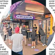  ?? Photo / Lincoln Tan ?? The queue for Burger Fuel in Takapuna on Tuesday. The chain said crowd controller­s would work outside its 56 New Zealand stores after the incident at its Glenfield outlet.