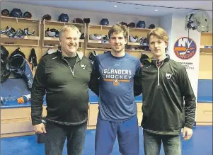  ?? PHOTO SUBMITTED/HARLEY PALMER ?? JP Morris, left, and his son Jack, right, are pictured with John Tavares of the New York Islanders following the Islanders game against the Washington Capitals on Jan. 31 in New York. The Morris’ won a trip to New York to see the Islanders play through...