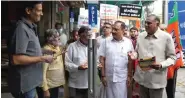  ?? ?? Delhi BJP Working President Virendra Sachdeva and others during Jan Sampark Abhiyan demanding resignatio­n of Delhi CM Arvind Kejriwal over the alleged liquor policy case, at Bengali Market, in New Delhi on Saturday. ANI