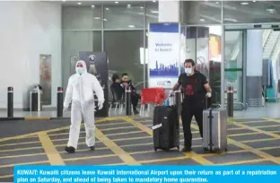  ??  ?? KUWAIT: Kuwaiti citizens leave Kuwait Internatio­nal Airport upon their return as part of a repatriati­on plan on Saturday, and ahead of being taken to mandatory home quarantine.
—Photos by Yasser Al-Zayyat