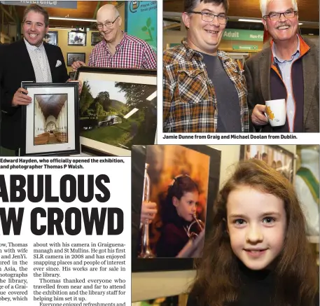  ??  ?? Edward Hayden, who officially opened the exhibition, and photograph­er Thomas P Walsh. Nine-year-old Jude Murray from Kilkenny with her in a photograph on display.
