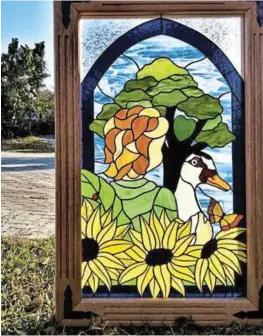  ??  ?? INSPIRATIO­NAL: A selection of Redmond's beautiful stained glass creations.