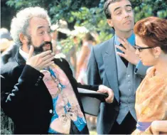  ??  ?? Days gone by: Simon Callow with John Hannah and Charlotte Coleman in 1994’s Four Weddings and a Funeral