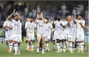  ?? Al Ain FC ?? Al Ain players celebrate after their Asian Champions League win over Al Hilal