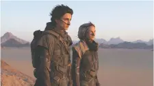  ?? TIFF ?? Timothée Chalamet, left, and Rebecca Ferguson share the screen in Dune, Canadian director Denis Villeneuve's latest sci-fi effort.