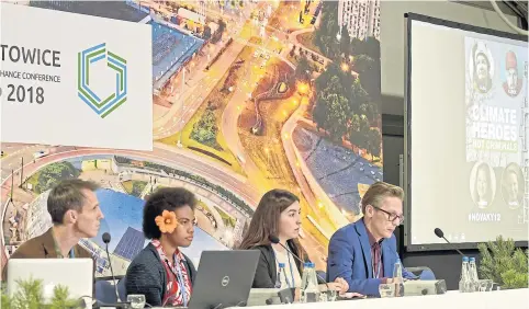  ?? AFP ?? Members of environmen­tal group Greenpeace give a press conference at the COP24 summit in Katowice, Poland.